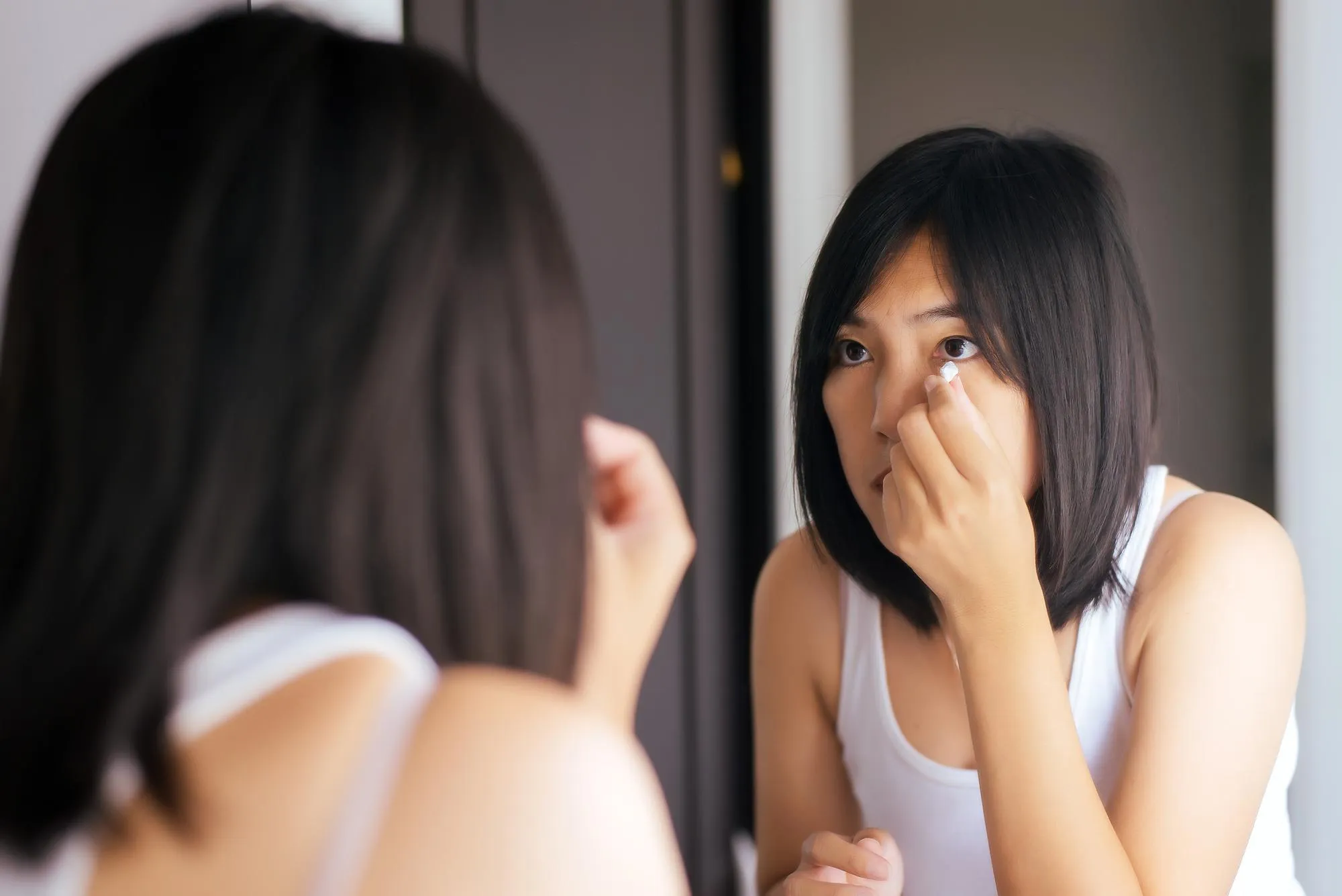 Woman Putting Makeup